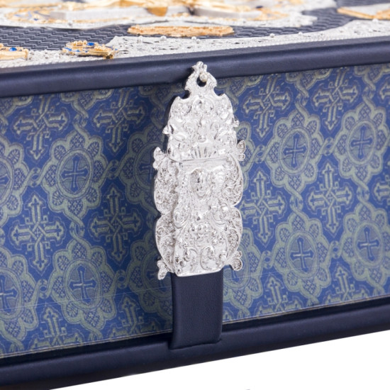 Біблія з позолоченим хрестом