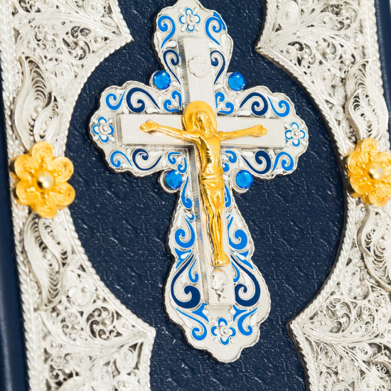 Біблія з позолоченим розп'яттям